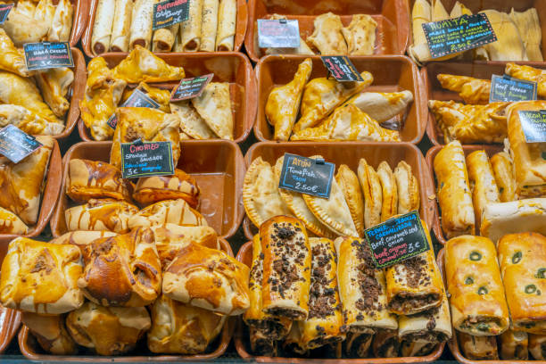Freshly baked foods on sale at La Boqueria Market in Barcelona.