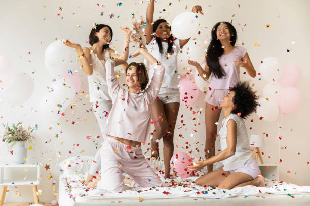 istock Overjoyed multiethnic friends have fun celebrating bachelorette party 1199737521