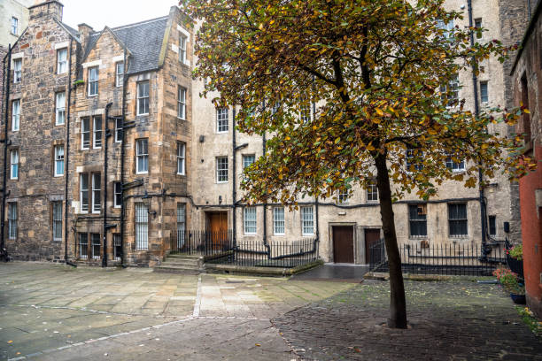 istock Traditional apartment buildings around a cobbled square 1199738712