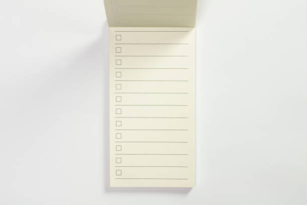 istock Blank to do list, wish list pocket planner with checklist for checkmarks isolated on white background, top view 1199740569