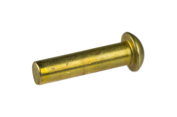 istock Bronze snap-bead rivet isolated on white background 1199742147
