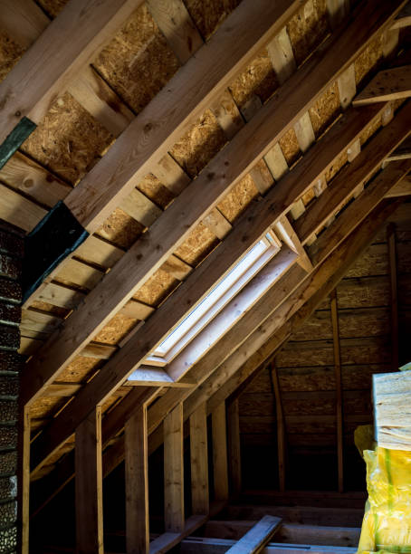 istock Wooden attic at home with window 1199746119