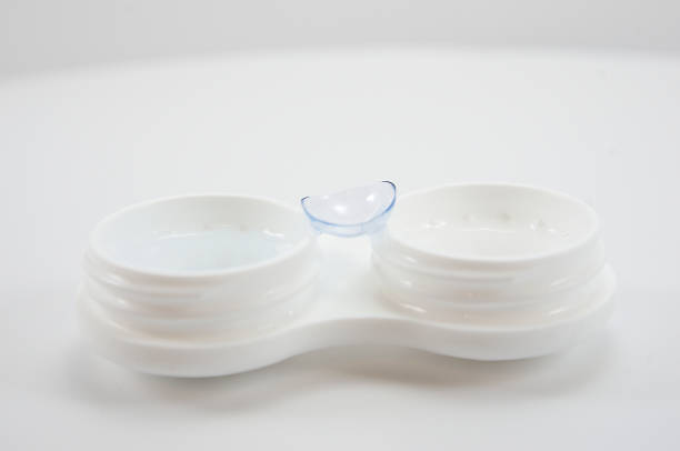 istock container for soft contact lenses and lens 1199746588
