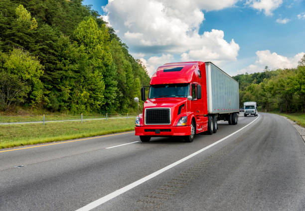 istock Red Truck on Interstate REWORKED 1199749886