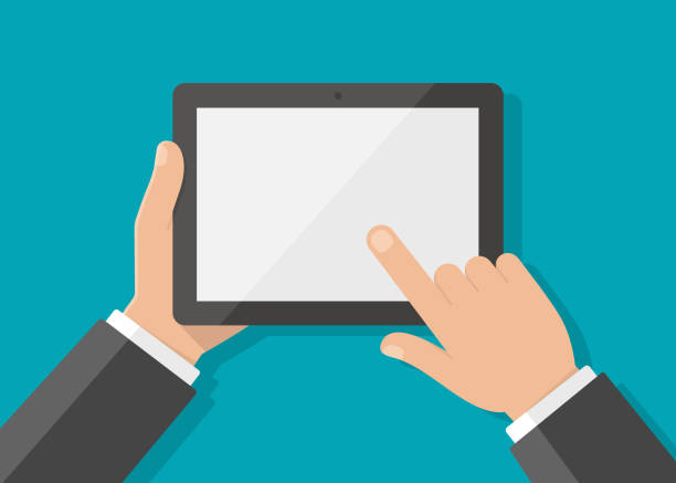 Man’s hand holding a tablet and touches the screen with his fingers Man’s hand holding a tablet and touches the screen with his fingers ipad hand stock illustrations