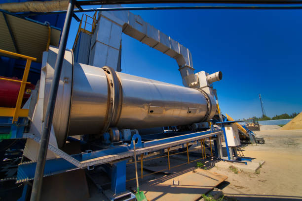istock Outdoor asphalt mixes station. Loading equipment. Asphalt mixture. Selective focus. 1199751864