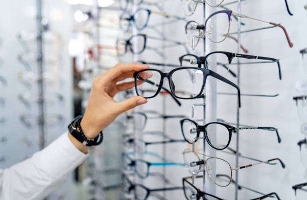 istock Row of glasses at an opticians. 1199751892