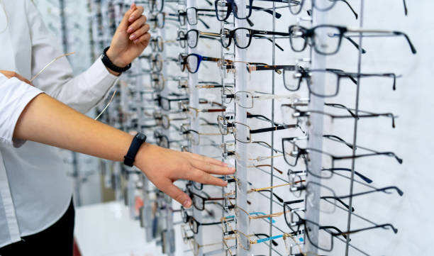 istock Row of glasses at an opticians. 1199751939