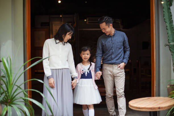 istock Asian Family Portrait in Front Yard 1199753792