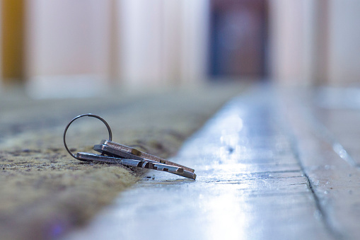 lost keys in the hotel lobby from the office, the background and background are blurred with the bokeh effect