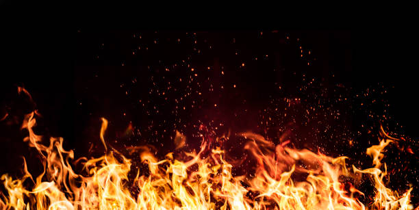 istock flames of fire on a black background 1199758650