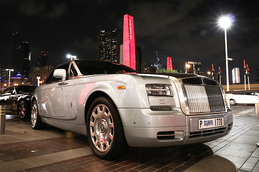 Dubai, UAE - November 18, 2018: Luxury car Rolls-Royce Phantom Drophead Coupe in the city street.