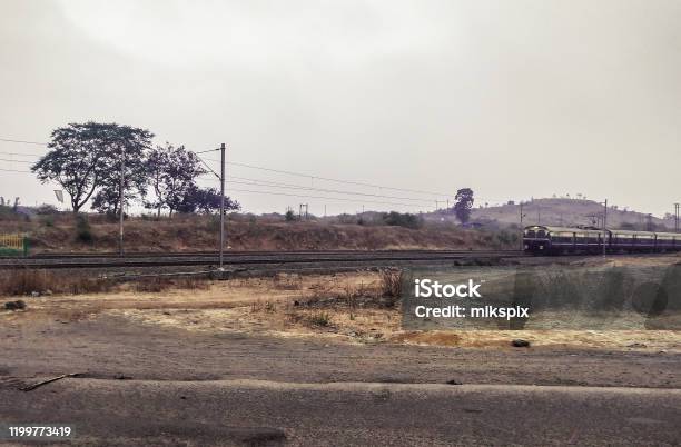 Running Train In Non Tropical Place Of India Stock Photo - Download Image Now - Asia, Beauty, Carriage