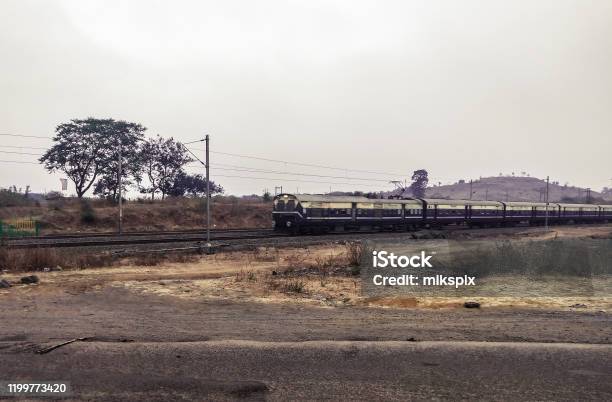 Running Train In Non Tropical Place Of India Stock Photo - Download Image Now - Asia, Beauty, Carriage