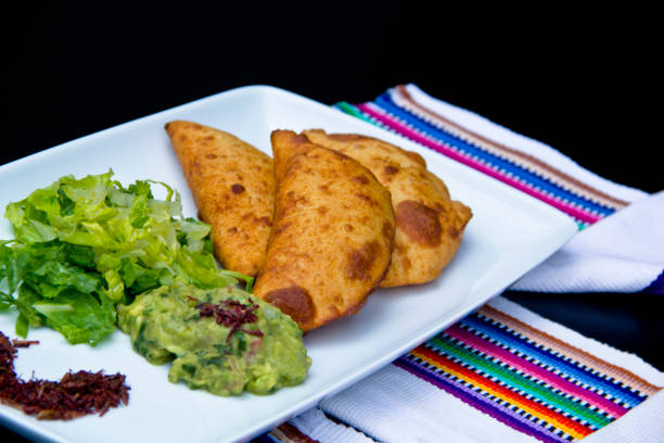 istock Mexican fried empanadas and salad 1199775464