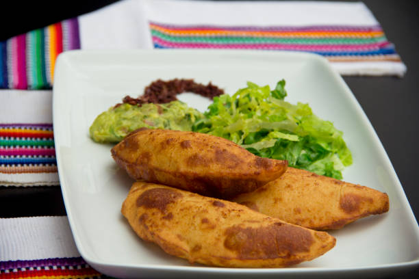 istock Mexican fried empanadas and salad 1199775474