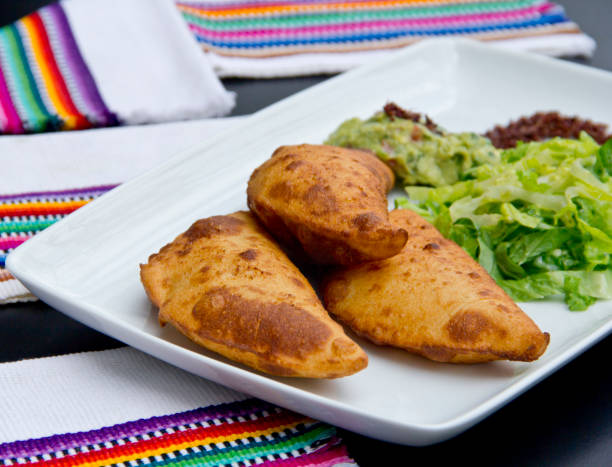 istock Mexican fried empanadas and salad 1199776030
