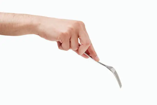 Man hand using a fork isolated against a white background