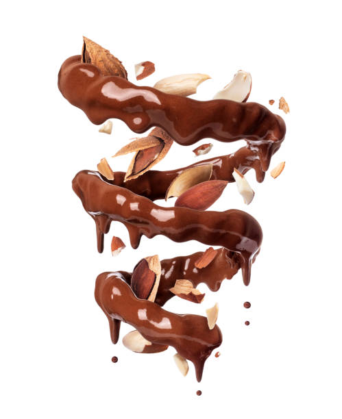 istock Chocolate splashes in spiral shape with crushed almonds, isolated on a white background 1199778649