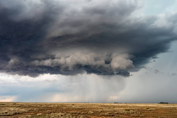 istock Storm clouds with dark sky and rain 1199783835