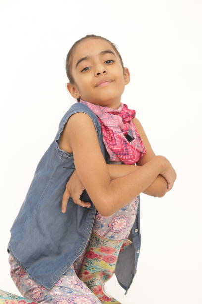 istock smiling girl posing for camera 1199800379