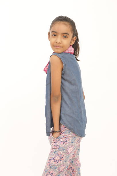 istock smiling girl posing for camera 1199800391