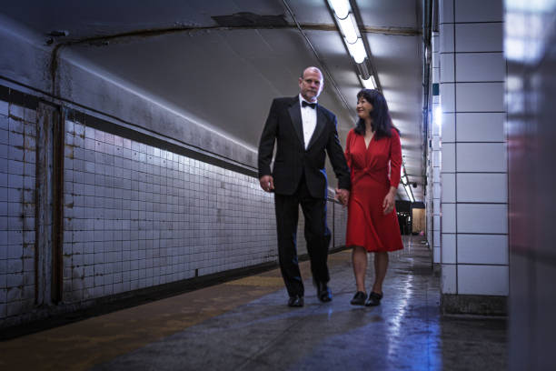 istock Elegant couple walking on subway station 1199800777