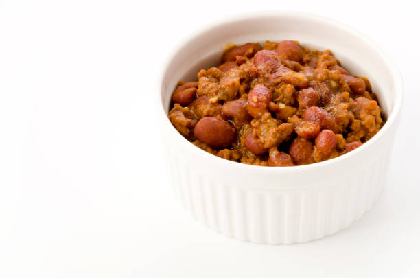 istock Chili con carne in a casserole on white background 1199801586
