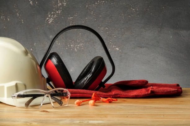 istock Safety Personal Protective Equipment(PPE) on a rustic black background. 1199802078