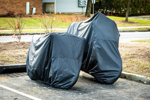 istock Storing two motorcycles outside under cover for protection 1199803484