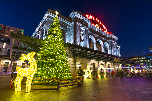 Denver, Colorado, USA - December 26, 2019: Christmas decorations and lights in front of Union Station in the LoDo district of Denver.