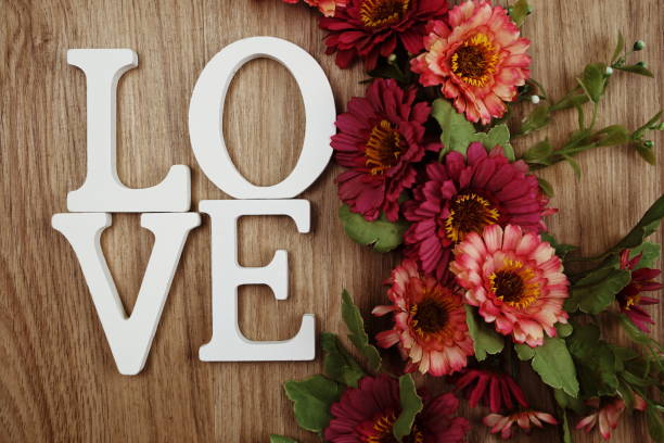 istock LOVE alphabet letters with space copy on wooden background 1199809030