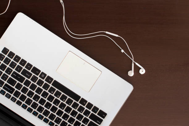 istock laptop and headphones 1199813016