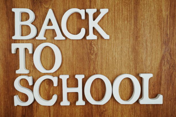 istock Back to School alphabet letter with space copy on wooden background 1199813061
