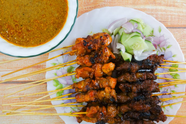 istock The Malaysian delicacy commonly known as Satay (bamboo stick skewered barbequed meat). 1199814658