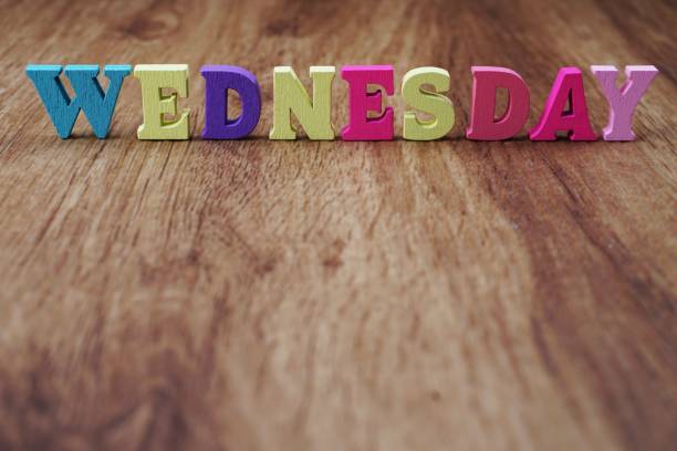 istock Wednesday alphabet letter with space copy on wooden background 1199814924
