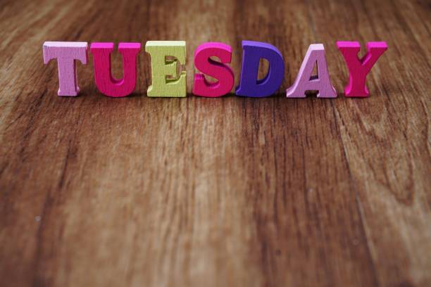 istock tuesday alphabet letter with space copy on wooden background 1199815584