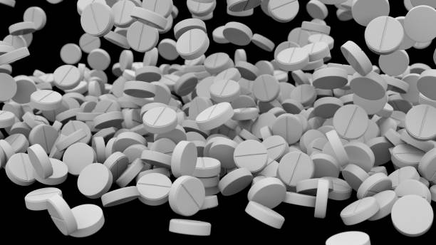 istock Falling pills, tablets. Medical concept. 3d rendering. Falling medical pills on black background 1199823232