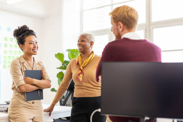 istock Group of Work Colleagues Having a Brainstorming Meeting 1199831118