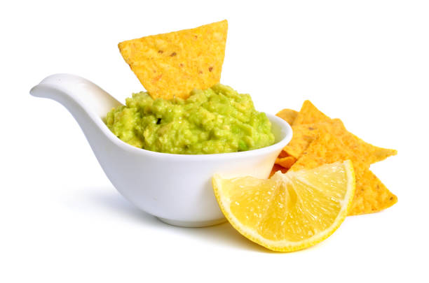 istock Guacamole with nachos. Isolated on white background 1199831168
