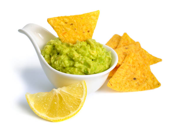 istock Guacamole with nachos. Isolated on white background 1199831181
