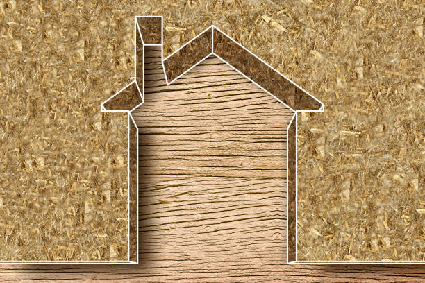 Thermal insulation coatings for residential construction with hemp fiber to reduce thermal losses against a wooden construction structure - Building energy efficiency and environmentally friendly concept image with copy space stock photo