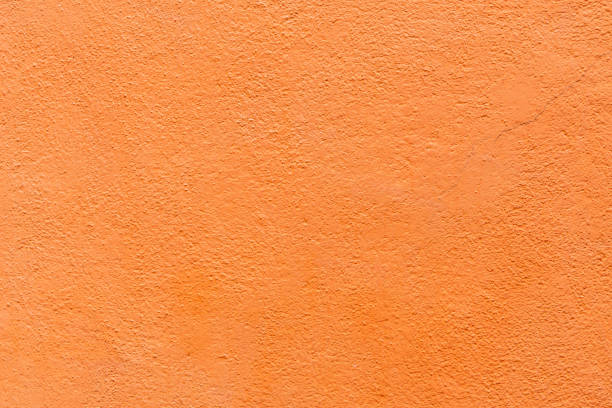 istock Orange outdoor wall cement texture abstract background 1199834697