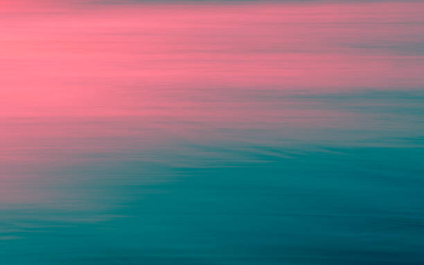 istock Ombre Pink to Turquoise Coastal Scene Blurred Motion Background 1199835862