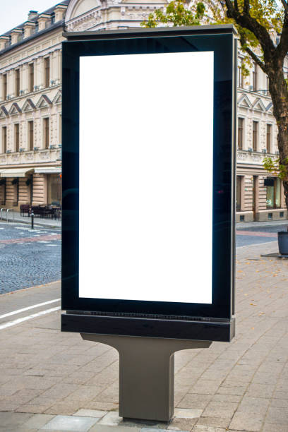 istock Mock up template. Blank billboard, public information board, advertising mock up banner in the city street 1199835954