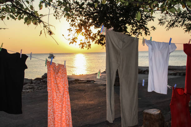 istock Colorful Clothes Drying Outside hang on line 1199843524