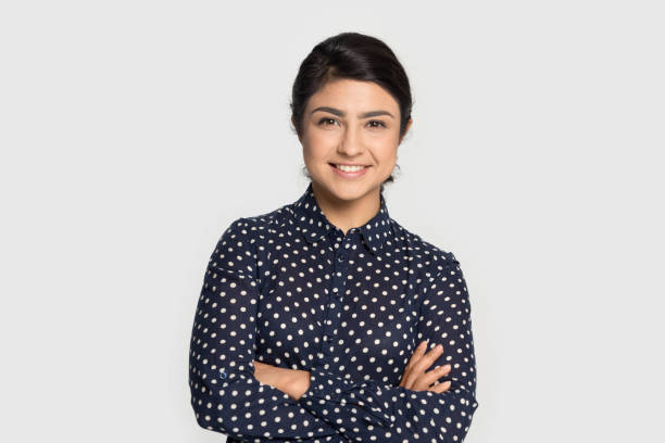istock Head shot studio portrait millennial pleasant indian ethnicity worker. 1199847347