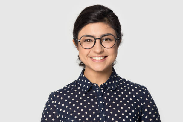 head shot studio portrait indial girl wearing eyeglasses. - indian ethnicity audio imagens e fotografias de stock