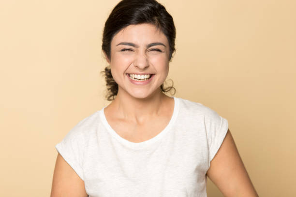 istock Indian ethnicity millennial lady laughing at joke, having fun. 1199847397