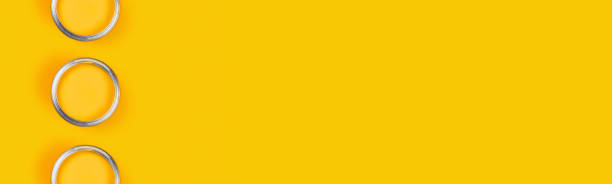 istock Yellow background with paint jars. 1199847768